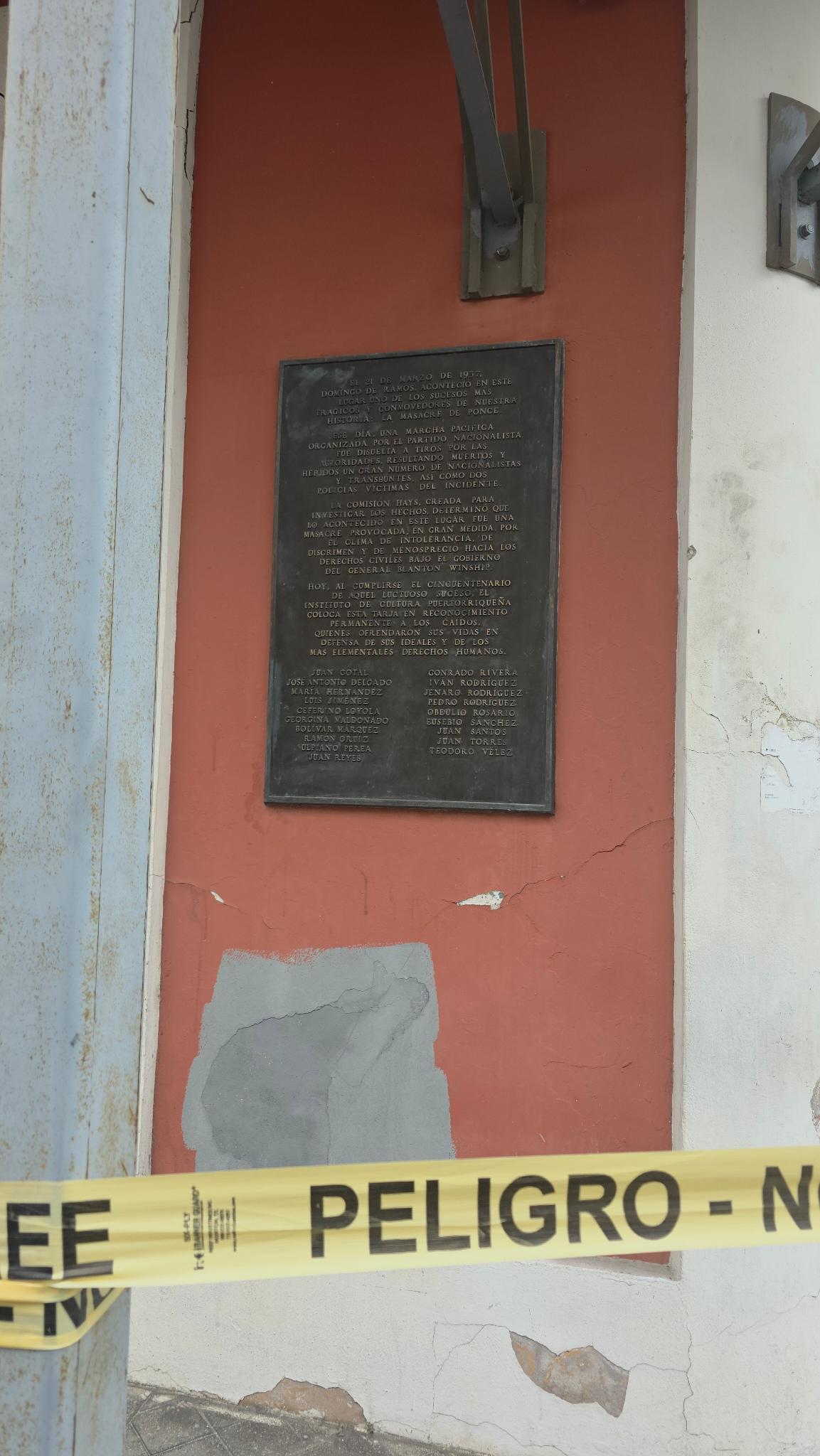 Memorial plaque with names of the 19 victims